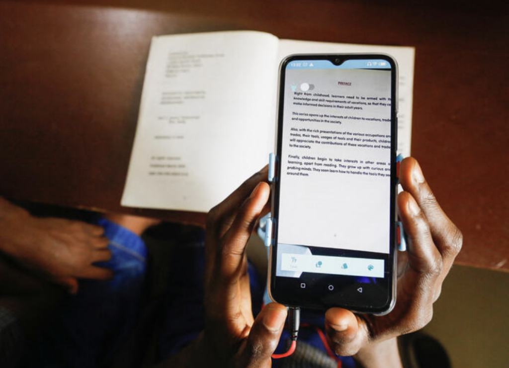A visually impaired student uses the Visis app at Pacelli School for The Blind and Partially Sighted Children, in Lagos, Nigeria, October 12, 2022. REUTERS/Temilade Adelaja
