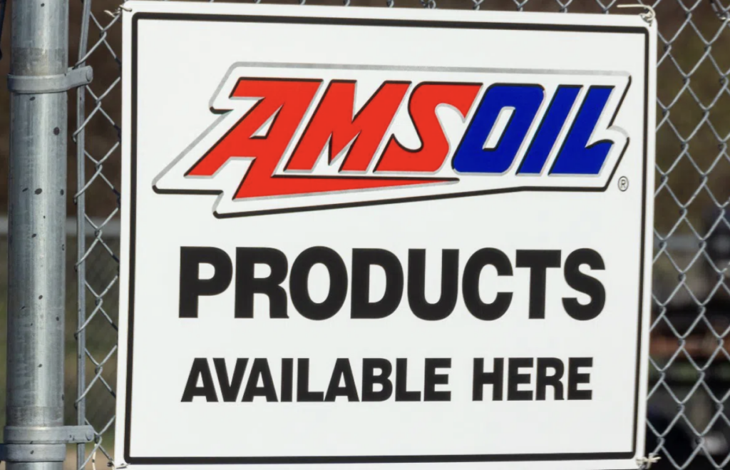 photo of sign - AMS OIL (logo) Products Available here