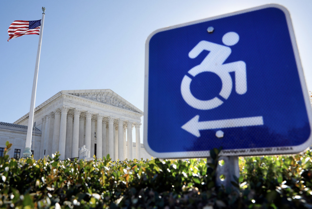 photo of handicapped parking sign in front of Lincoln Memorial Monument